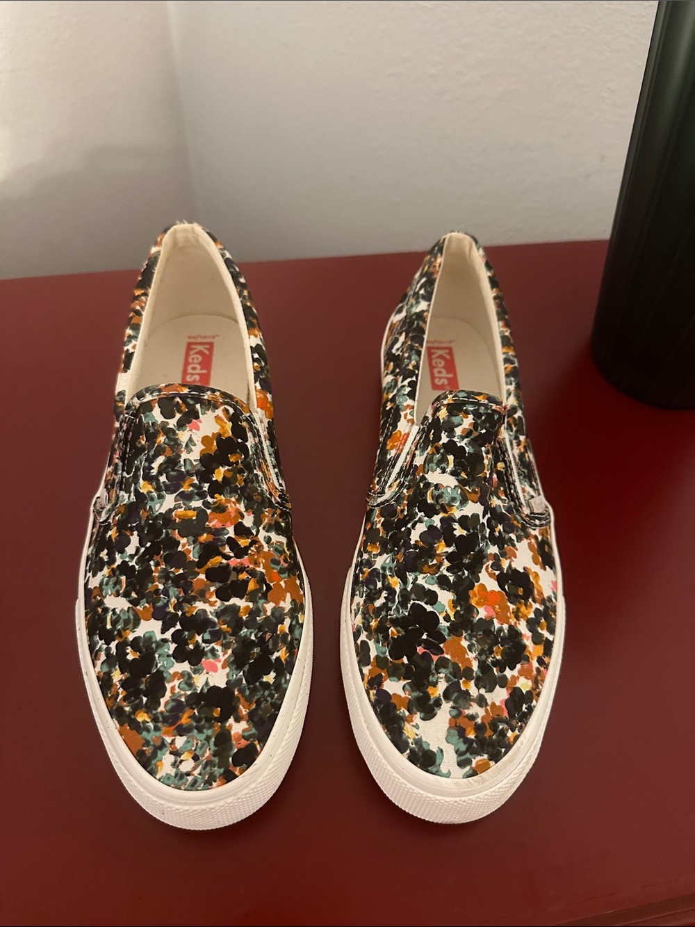 Keds Slip-On Sneakers in Black, Orange, Teal Floral Print